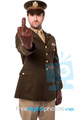 Angry Army Officer Showing Middle Finger Stock Photo