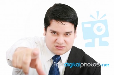 Angry Young Business Man Pointing At You  Stock Photo