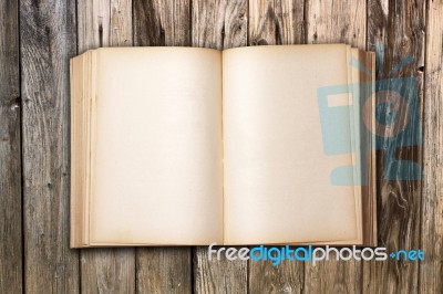 Antique Book On Wood Table Stock Photo