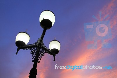 Antique Lamps On Twilight Sky Background Stock Photo