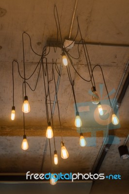 Antique Light Bulbs Hanging On The Ceiling Stock Photo