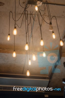 Antique Light Bulbs Hanging On The Ceiling Stock Photo