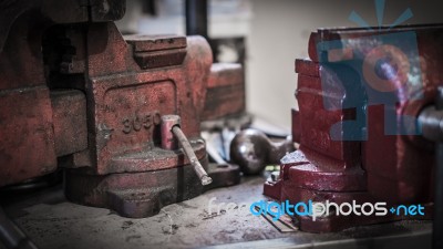 Antique Vices On Workbench Stock Photo