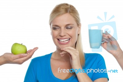 Apple Or Coffee? Stock Photo