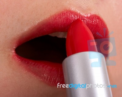 Applying Red Lipstick Stock Photo