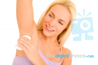 Applying Under Arm Deodorant Stock Photo