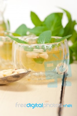 Arab Traditional Mint And Pine Nuts Tea Stock Photo