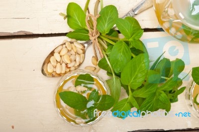 Arab Traditional Mint And Pine Nuts Tea Stock Photo