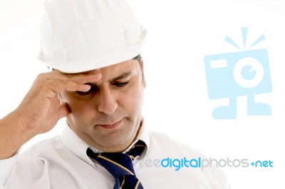 Architect Holding His Head In Pain Stock Photo