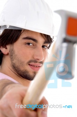 Architect Showing Hammer Stock Photo