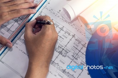 Architectural Blueprints And Blueprint Rolls And A Drawing Instr… Stock Photo