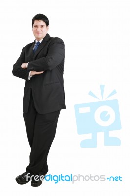 Arm Crossed Businessman Standing Stock Photo