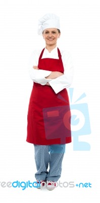 Arm Crossed Female Chef Standing Stock Photo