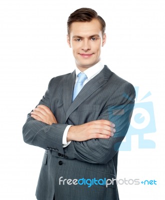 Arms Crossed Businessman Stock Photo