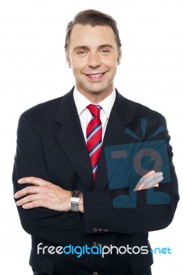 Arms Crossed Portrait Of Caucasian Businessman Stock Photo