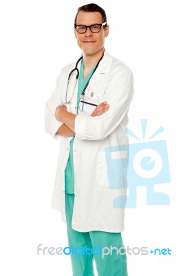 Arms Crossed Young Male Doctor Stock Photo