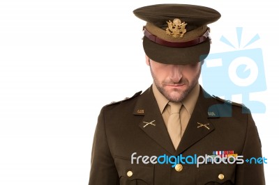 Army Man Looking Down, Filled With Shame Stock Photo