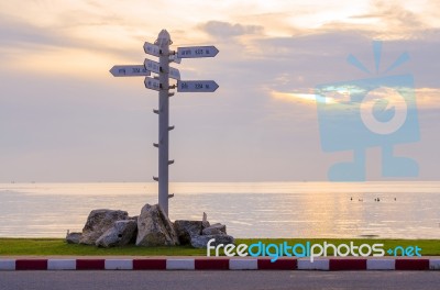 Arrow Sign In Sunset Time Stock Photo