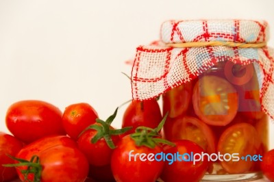 Artisanal Preparation Of Pickles Of Organic Cherry Tomatoes Stock Photo