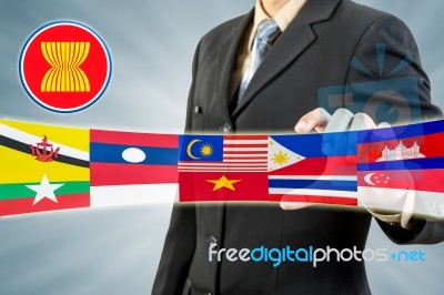 Asean Economic Community In Businessman Hand Stock Photo