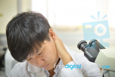 Asia Scientist Working In Biological Laboratory Stock Photo