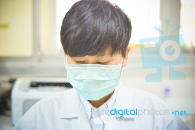 Asia Scientist Working In Biological Laboratory Stock Photo