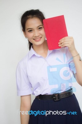 Asia Thai High School Student Uniform Beautiful Girl Read A Book… Stock Photo