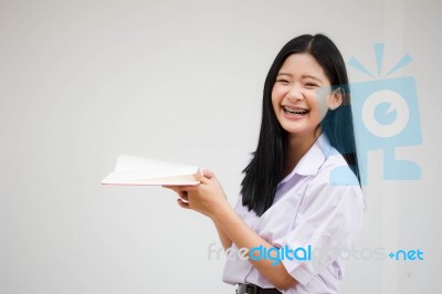 Asia Thai High School Student Uniform Beautiful Girl Read A Book… Stock Photo