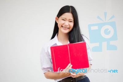 Asia Thai High School Student Uniform Beautiful Girl Read A Book… Stock Photo