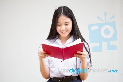 Asia Thai High School Student Uniform Beautiful Girl Read A Book… Stock Photo