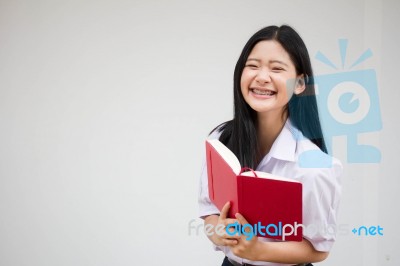 Asia Thai High School Student Uniform Beautiful Girl Read A Book… Stock Photo