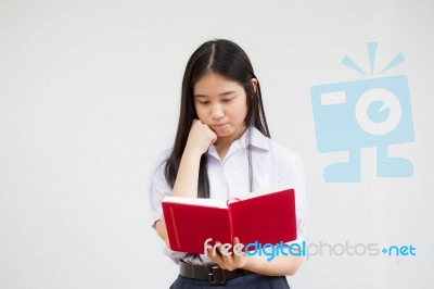 Asia Thai High School Student Uniform Beautiful Girl Read A Book… Stock Photo