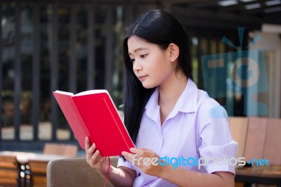 Asia Thai High School Student Uniform Beautiful Girl Read A Book… Stock Photo