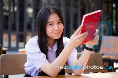 Asia Thai High School Student Uniform Beautiful Girl Read A Book… Stock Photo