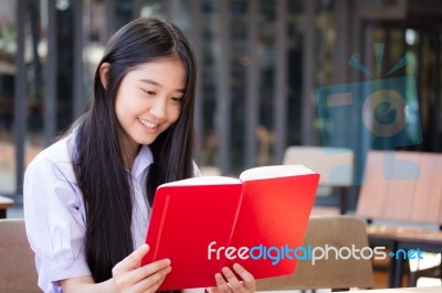 Asia Thai High School Student Uniform Beautiful Girl Read A Book… Stock Photo