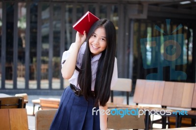 Asia Thai High School Student Uniform Beautiful Girl Read A Book… Stock Photo