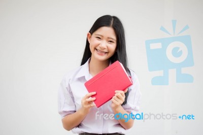 Asia Thai High School Student Uniform Beautiful Girl Read A Book… Stock Photo