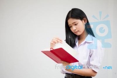 Asia Thai High School Student Uniform Beautiful Girl Read A Book… Stock Photo