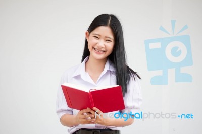 Asia Thai High School Student Uniform Beautiful Girl Read A Book… Stock Photo