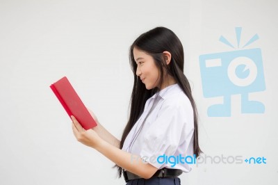 Asia Thai High School Student Uniform Beautiful Girl Read A Book… Stock Photo