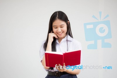 Asia Thai High School Student Uniform Beautiful Girl Read A Book… Stock Photo