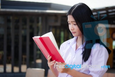 Asia Thai High School Student Uniform Beautiful Girl Read A Book… Stock Photo