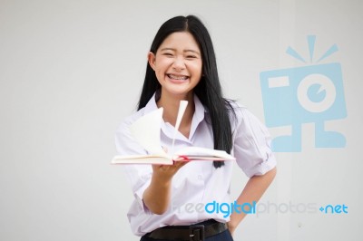 Asia Thai High School Student Uniform Beautiful Girl Read A Book… Stock Photo