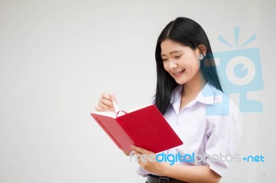 Asia Thai High School Student Uniform Beautiful Girl Read A Book… Stock Photo