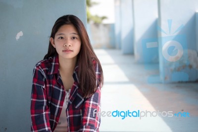 Asia Thai Teenager Women Scotch T-shirt Relax And Smile Stock Photo