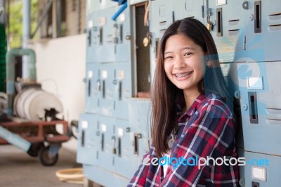 Asia Thai Teenager Women Scotch T-shirt Relax And Smile Stock Photo