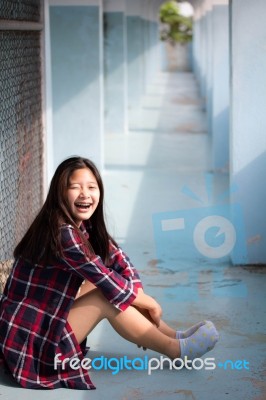 Asia Thai Teenager Women Scotch T-shirt Relax And Smile Stock Photo