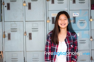 Asia Thai Teenager Women Scotch T-shirt Relax And Smile Stock Photo