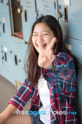 Asia Thai Teenager Women Scotch T-shirt Relax And Smile Stock Photo