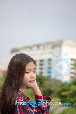 Asia Thai Teenager Women Scotch T-shirt Relax And Smile Stock Photo